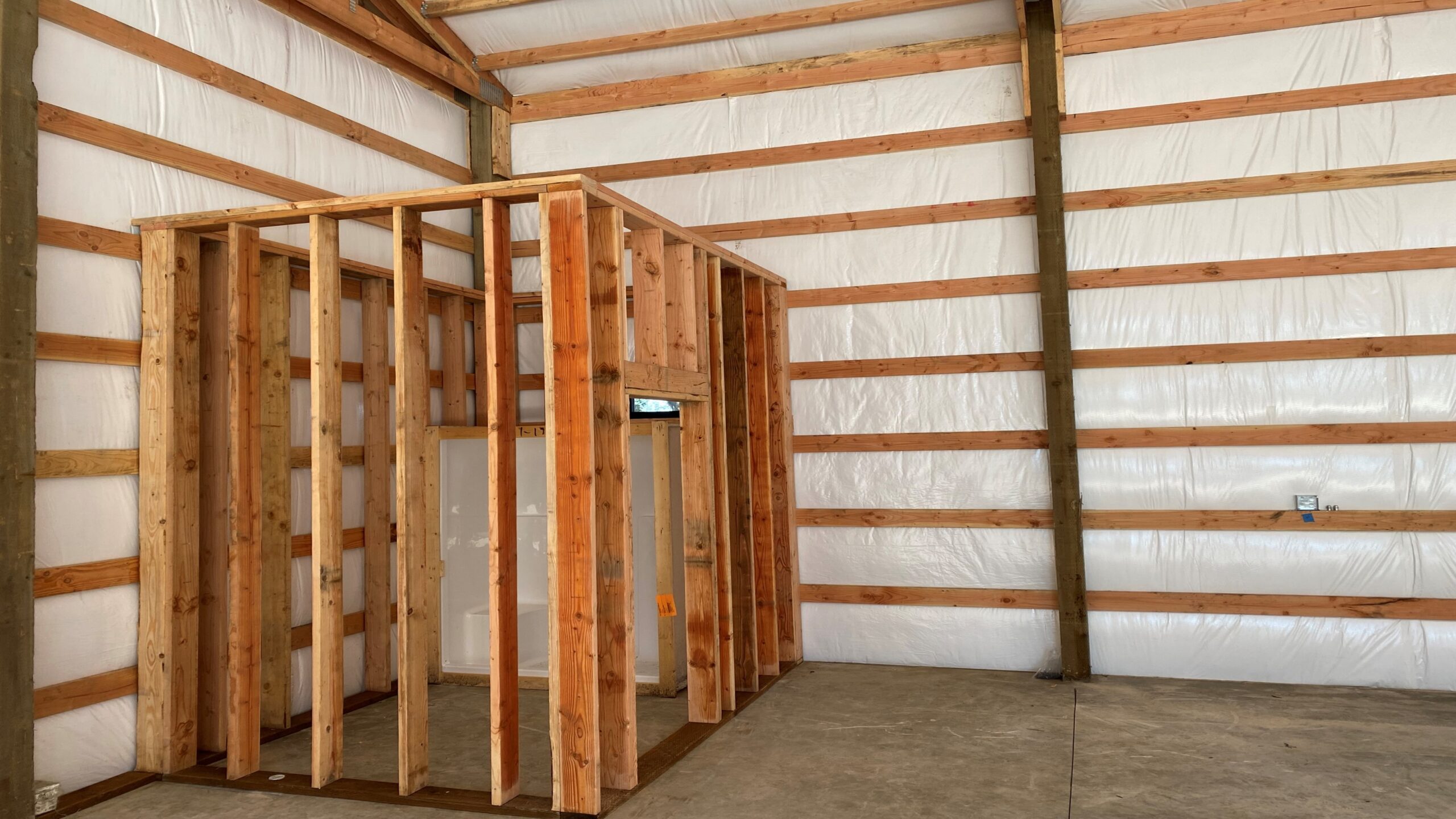 Interior post frame wall framing during a renovation